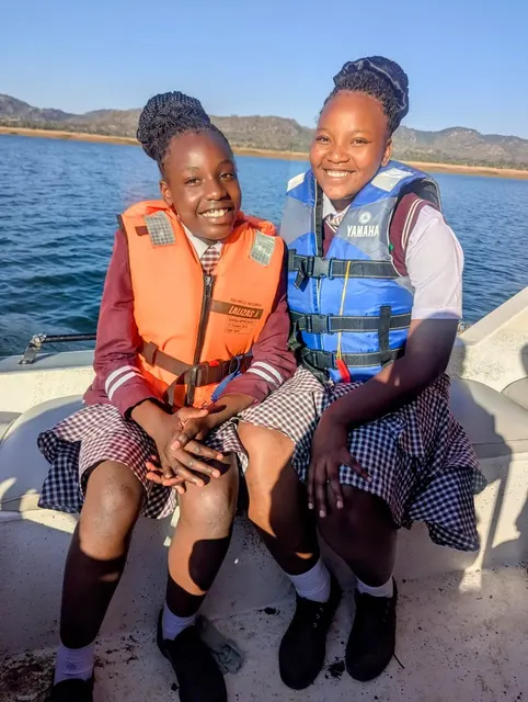 Learners wearing life jackets during a water activity